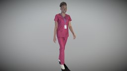 Young woman in surgical uniform walking 242
