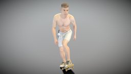 Shirtless man riding on a skateboard 191