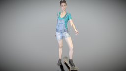 Young girl in overalls on a skateboard 211